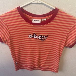Cropped orange and red tripe shirt from OBEY in an extra small